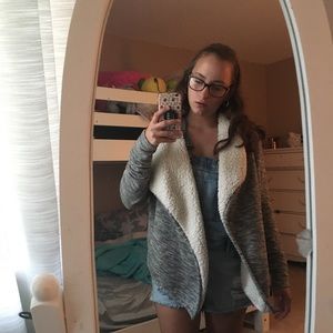 Grey coat with white interior fur